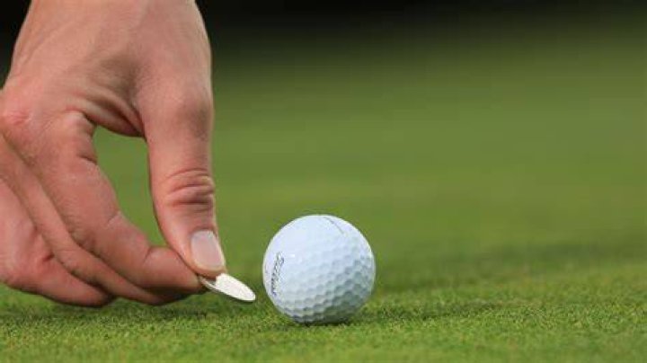 Can you refuse to mark your ball on the green?