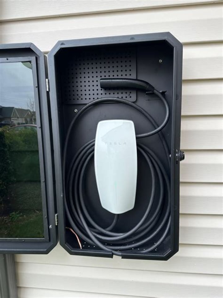 How much does it cost to install a Tesla charger in garage?