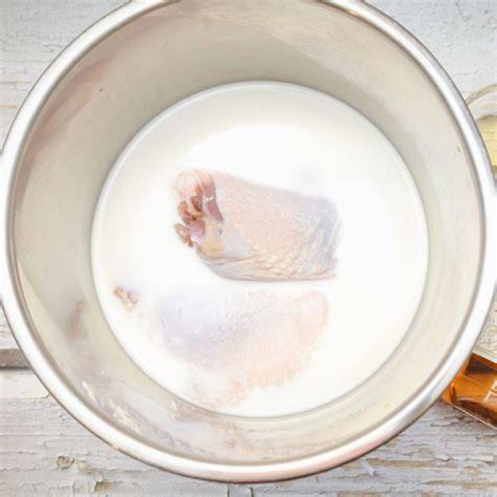 What do you soak chicken in to clean?