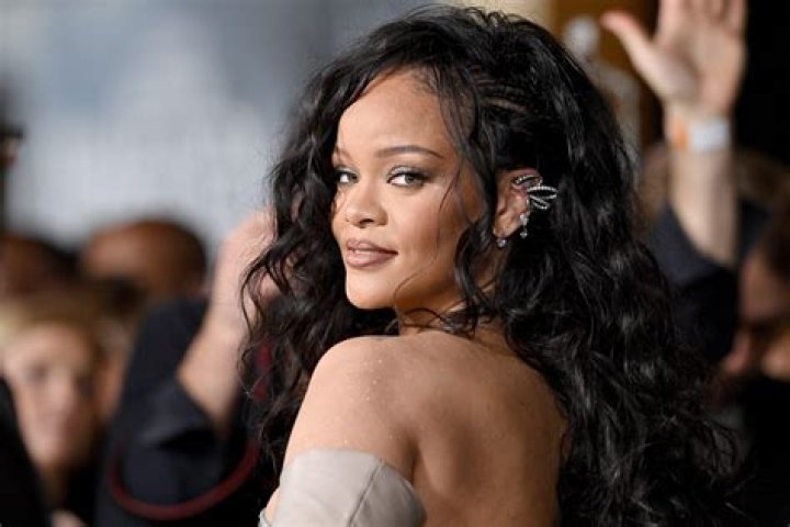 What does Rihanna's butt tattoo say?