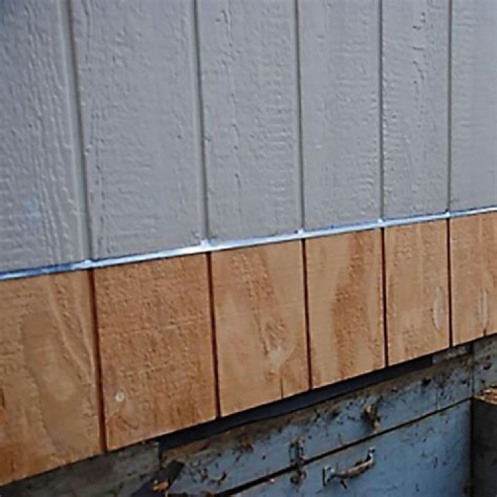 What goes at the bottom of siding?