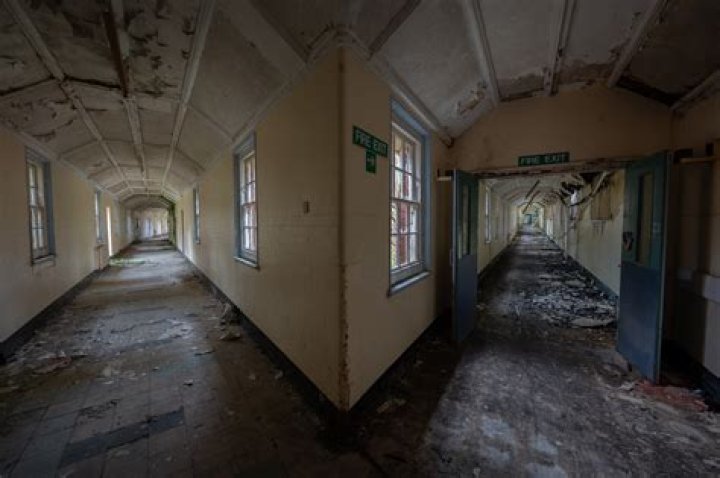 Why did insane asylums close in the UK?