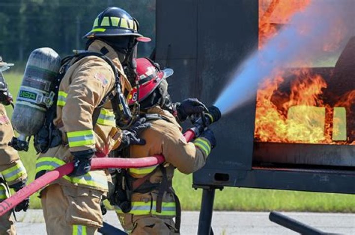 Why do firemen cut a hole in the roof?