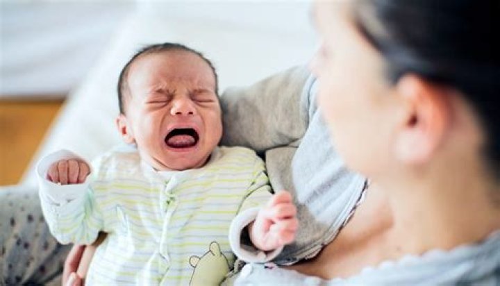 Why does baby pull off breast and cry?