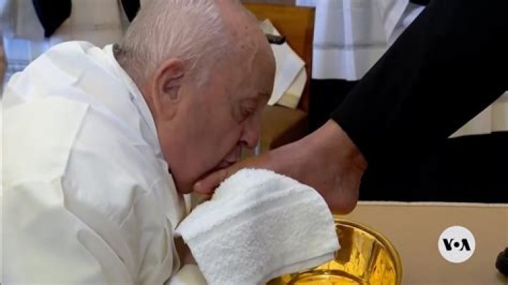 Why does the pope kiss feet?